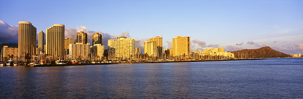 Hawaii, Oahu, Waikiki and Diamond Head in the afternoon sunlight, View from ocean.