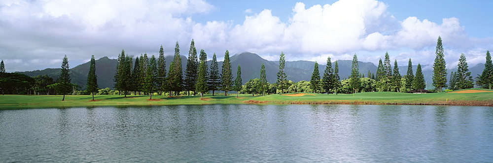 Hawaii, Kauai, Princeville Resort Golf Course, Lakes Course 18th hole, view from across water, panoramic