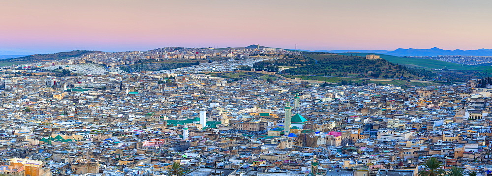 Elevated view across the Old Medina of Fes illuminated at dusk, UNESCO World Heritage Site, Fes, Morocco, North Africa, Africa