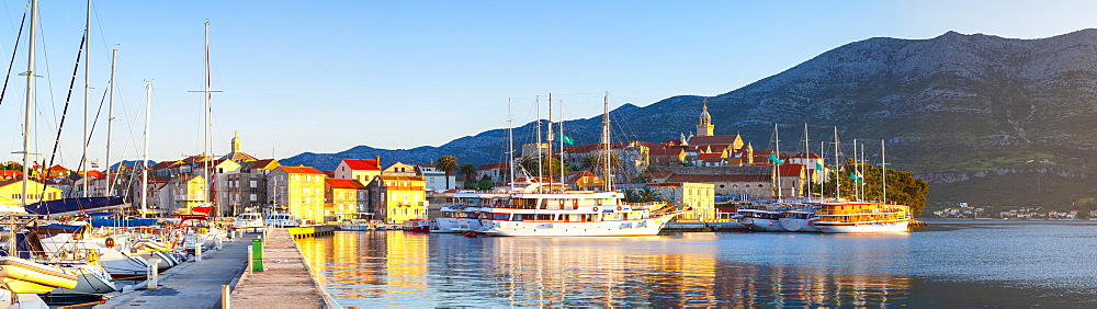 The picturesque coastal village of Korcula illuminated at sunrise, Korcula Town, Korcula, Dalmatia, Croatia, Europe