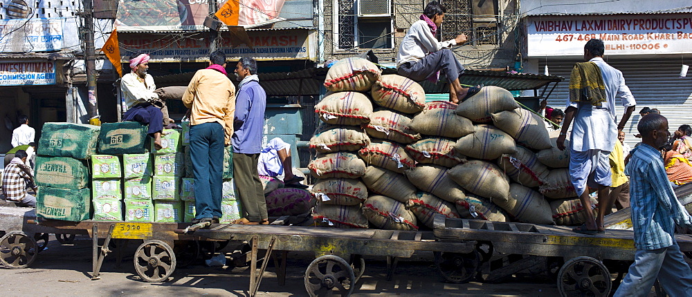 Porters at Khari Baoli spice and dried foods market, Old Delhi, India