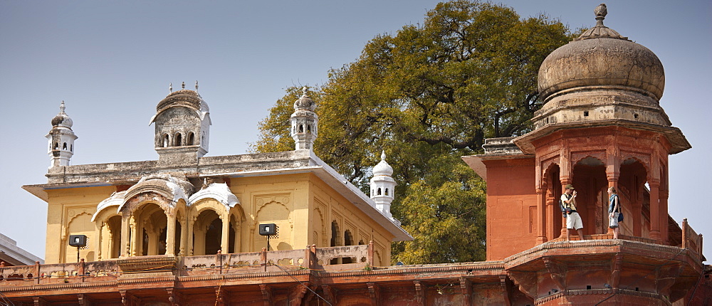 Tourists at Maharaja Chet Singh Palace Fort at Chet Singh Ghat by The Ganges River in holy city of Varanasi, Northern India