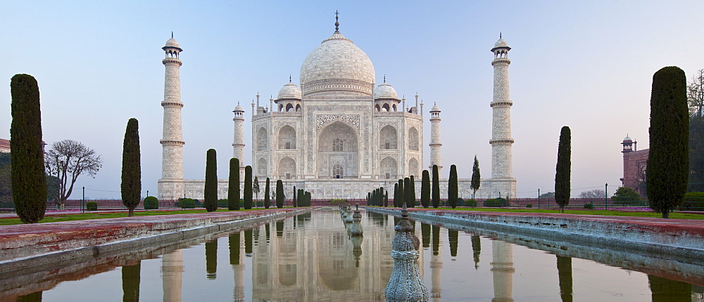 The Taj Mahal mausoleum southern view with reflecting pool and cypress trees, Uttar Pradesh, India