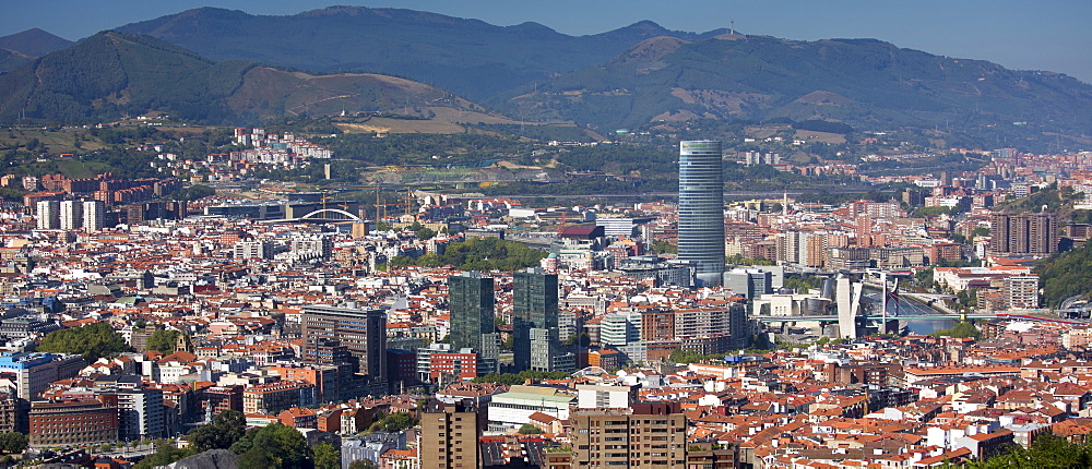 Aerial view of Bilbao Guggenheim Museum, Iberdrola Tower skyscraper and Red Bridge in Basque country, Spain