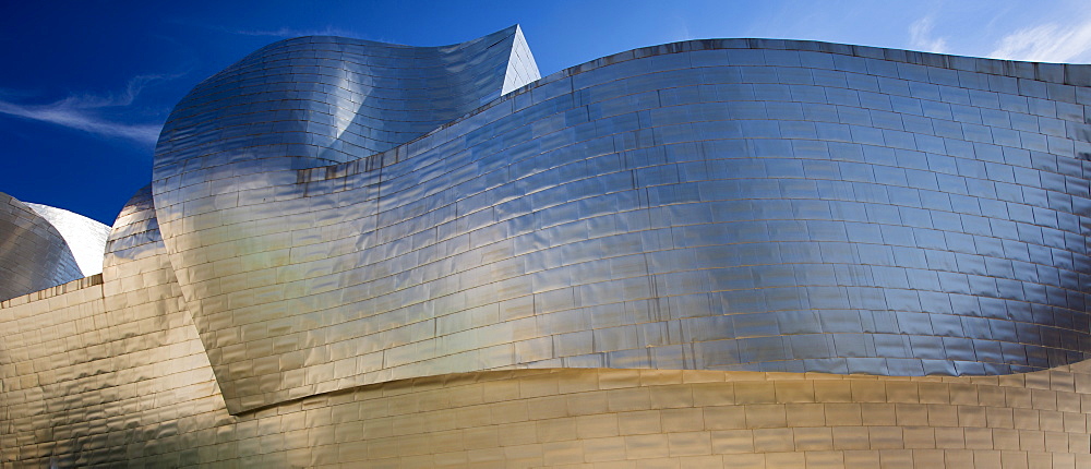 Architect Frank Gehry's Guggenheim Museum futuristic architectural design in titanium at Bilbao, Basque country, Spain