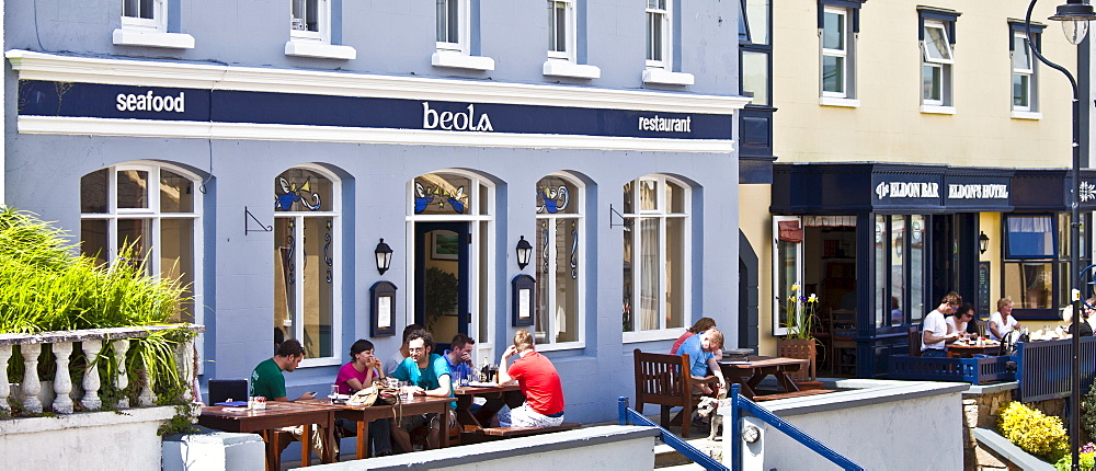 Tourists at Beola seafood restaurant in Roundstone, Connemara, County Galway, Ireland