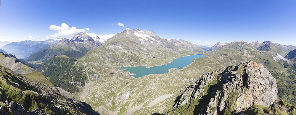 Panorama of the blue Lago Bianco surrounded by high peaks, Bernina Pass, Canton of Graubunden, Engadine, Swiss Alps, Switzerland, Europe