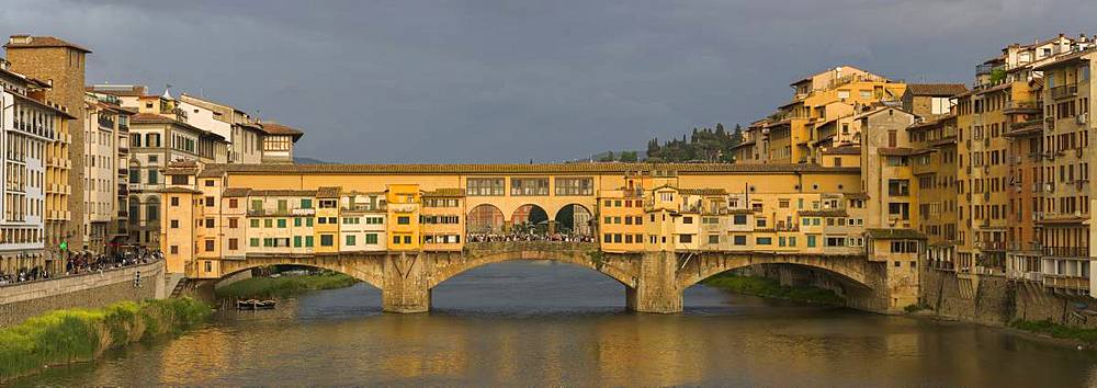 A panorama of the Ponte Vecchio bridge spanning the Arno River in Florence, UNESCO World Heritage Site, Tuscany, Italy, Europe