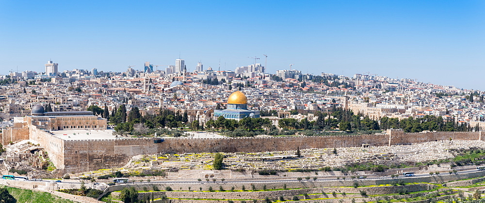 Tombstones on the Mount of Olives with the Old City in background, Jerusalem, Israel, Middle East