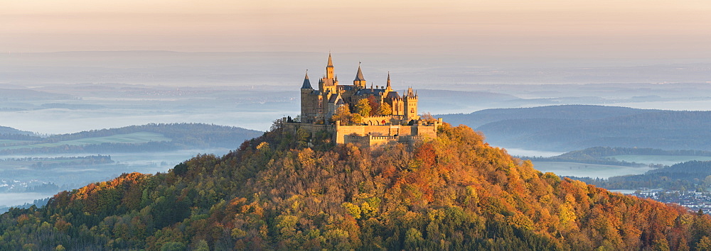 Hohenzollern Castle in autumnal scenery at dawn, Hechingen, Baden-Wurttemberg, Germany, Europe