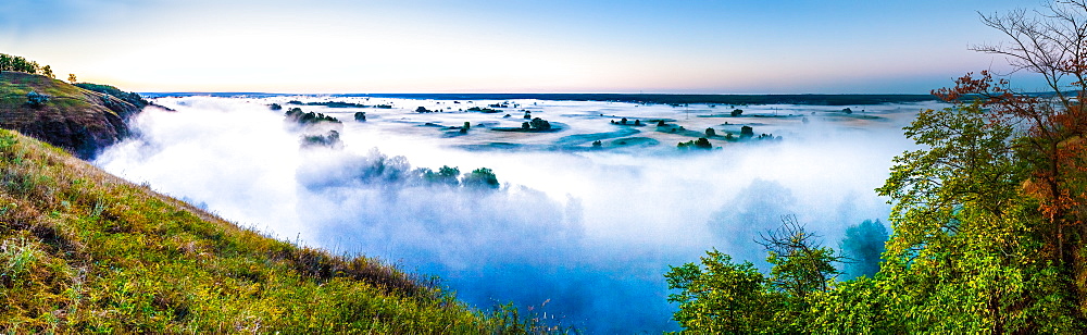 Misty dawn over hills and river, Ukraine, Europe