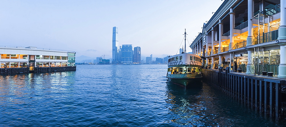 Star Ferry leaving Hong Kong Island, towards Kowloon at night, Hong Kong, China, Asia