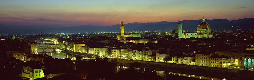 View at night over rooftops of Florence, showing Duomo, Uffizi and Ponte Vecchio from Pizalle Michelangelo, Florence, Tuscany, Italy, Europe