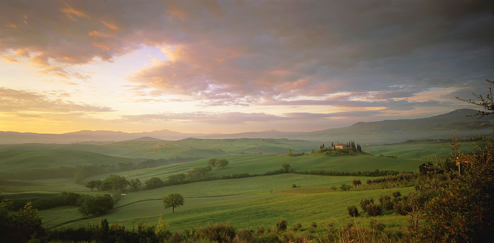 Panoramic view of Val d'Orcia at dawn, in spring, near San Quirico d'Orcia, Tuscany, Italy, Europe