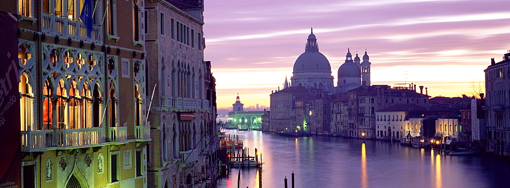 View at dusk along Grand Canal towards Santa Maria Della Salute from Accademia Bridge, Venice, UNESCO World Heritage Site, Veneto, Italy, Europe