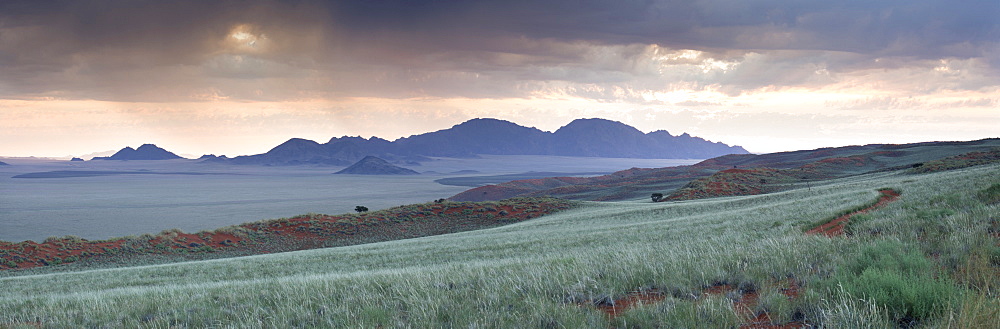 Panoramic view at dusk over the magnificent landscape of the Namib Rand game reserve, Namib Naukluft Park, Namibia, Africa