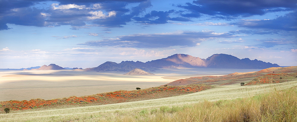 Panoramic view at dusk over the magnificent landscape of the Namib Rand game reserve, Namib Naukluft Park, Namibia, Africa