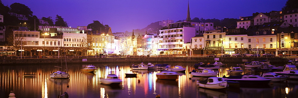 Town viewed over harbour at dusk, Torquay, Devon, England, United Kingdom, Europe