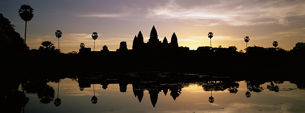 Silhouette of the temple of Angkor Wat reflected in the lake, UNESCO World Heritage Site, Angkor, Siem Reap Province, Cambodia, Indochina, Southeast Asia, Asia