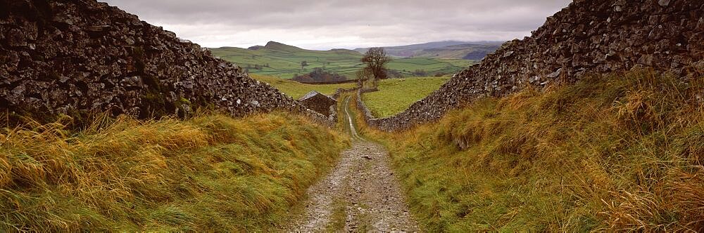 Long pathway on a landscape, Smearsett Scar, Yorkshire, England