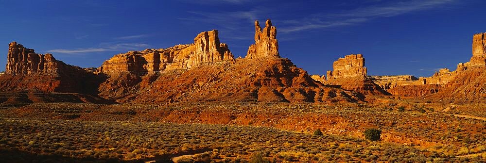 Rock formations on a landscape, Monument Valley Tribal Park, Monument Valley, Arizona, USA