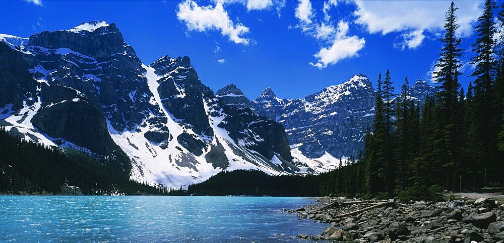 Lake in front of snowcapped mountains, Moraine Lake, Alberta, Canada