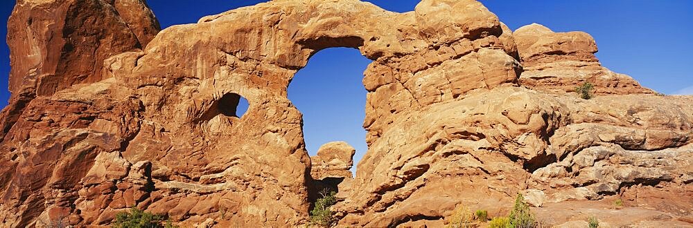 Low angle view of rock formations, Turret Arch, Arches National Park, Utah, USA