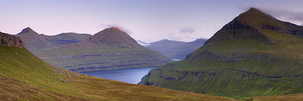 Panoramic view of Eysturoy hills from near Funningur, Husafjall at 895m high on the right, Mulatindur in the distance, Eysturoy, Faroe Islands (Faroes), Denmark, Europe