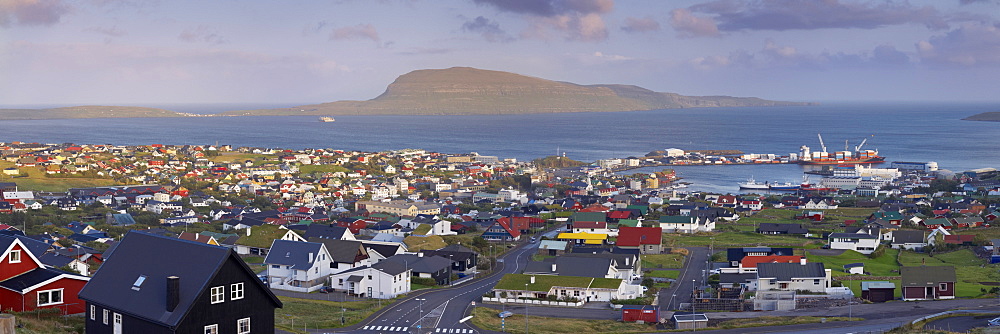 Panoramic view of Torshavn and harbour (Nolsoy in the distance), capital of the Faroe Islands (Faroes), Denmark, Europe