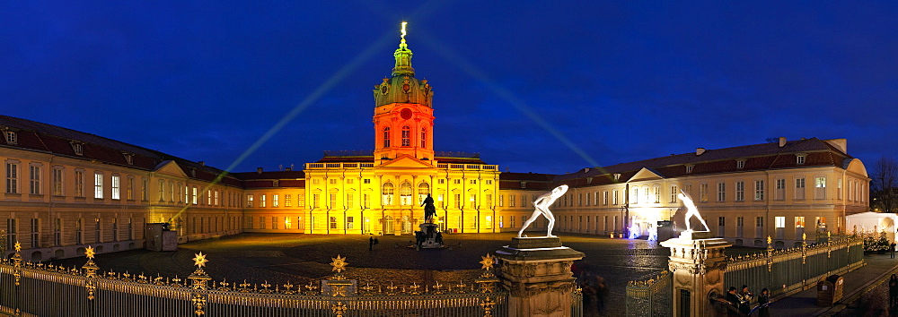 Christmas market at Schloss Charlottenburg (Charlottenburg Castle), illuminated at night, Berlin, Germany, Europe