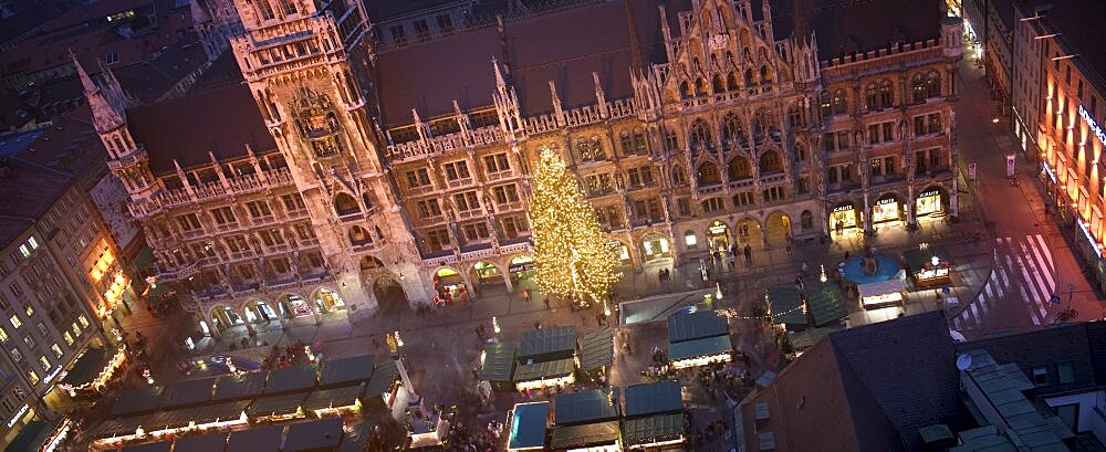 GERMANY Munich Panoramic view of the Christmas Market beneath the Rathaus. Christkindlesmarkt Festive Advent Yuletide Travel Holidays Christmas Tree Fairy Lights Rathaus Panorama