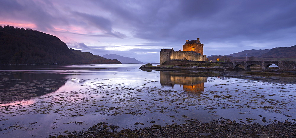 Twilight over Eilean Donan Castle on Loch Duich, Dornie, Scotland, United Kingdom, Europe