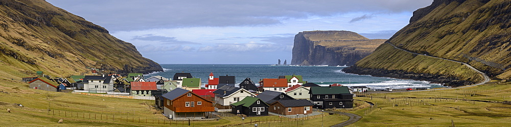 Panorama of the pretty coastal village of Tjornuvik on the island of Streymoy, Faroe Islands, Denmark, Europe