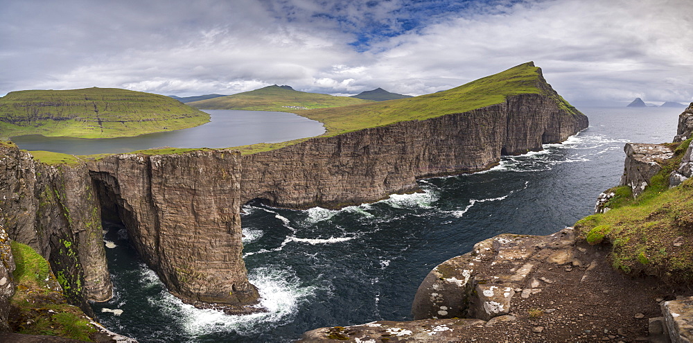 The dramatic Vagar coastline from Traelana?pa cliff above Sorvagsvatn Lake in the Faroe Islands, Denmark, Europe