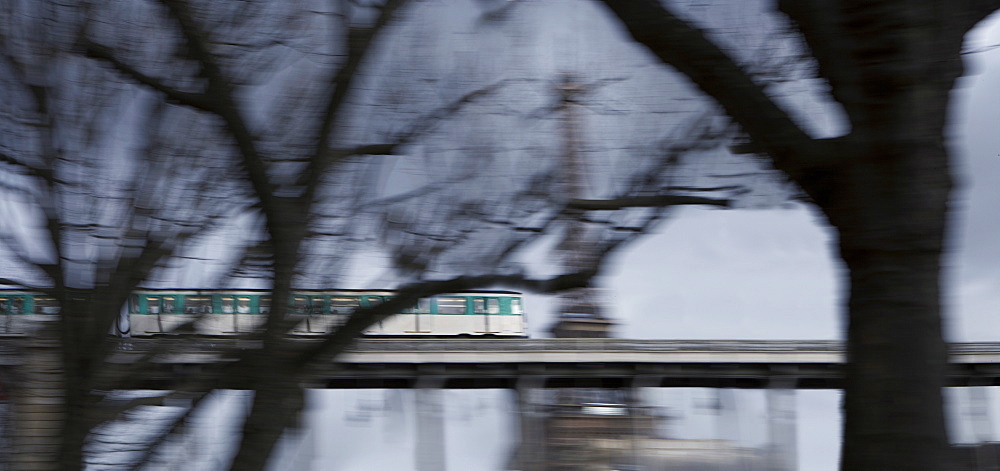 Eiffel Tower and Metro train on Pont de Bir Hakeim, Paris, France, Europe