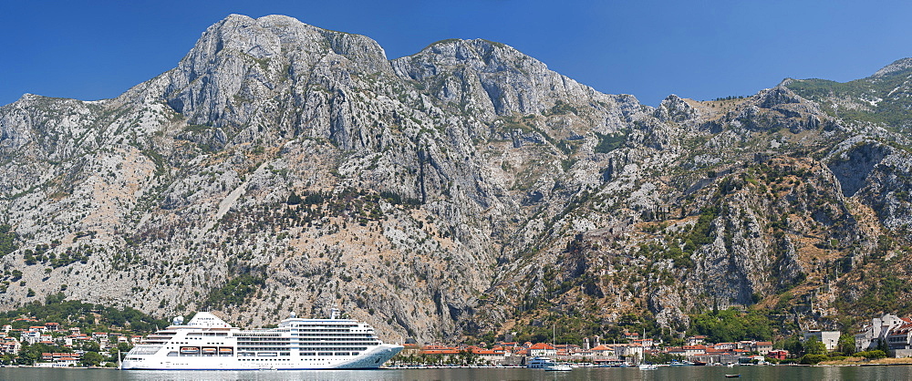 Panoramic view of a cruise ship at the port of Kotor in Kotor Bay, UNESCO World Heritage Site, Montenegro, Europe