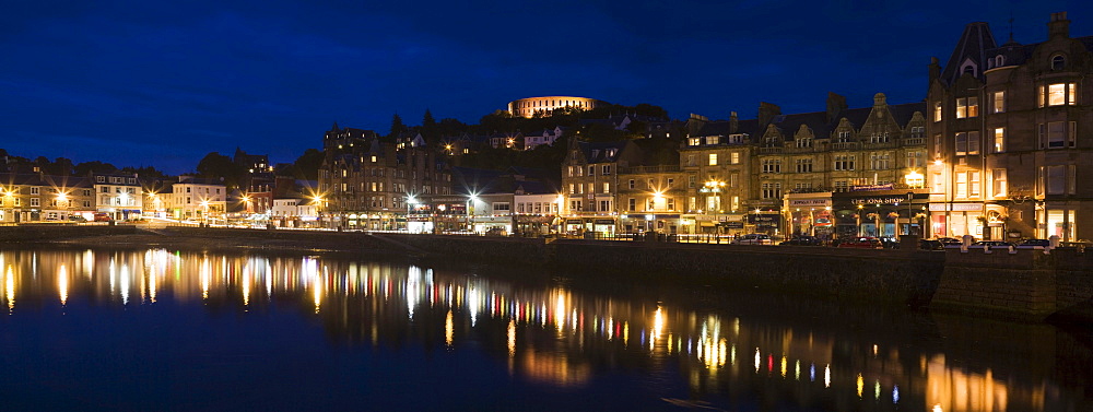 Oban with the promenade and McCaig's Tower at night, Argyll, Scotland, United Kingdom, Europe