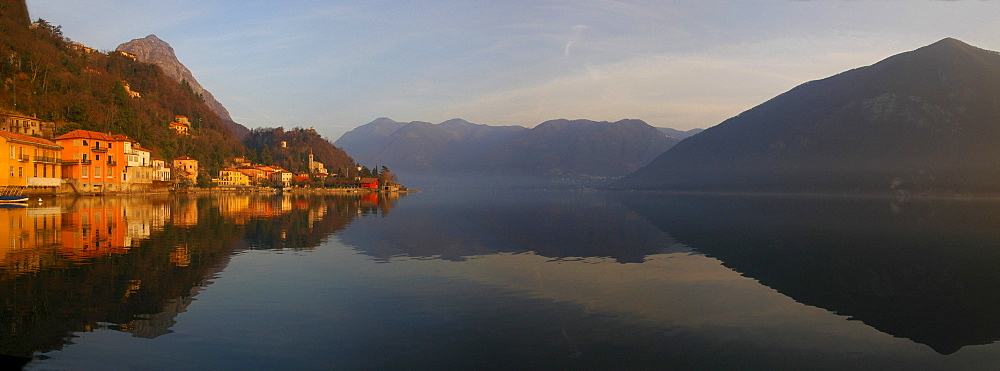 San Mamete reflected in Lake Lugano, Ticino, Switzerland, Italy, Europe