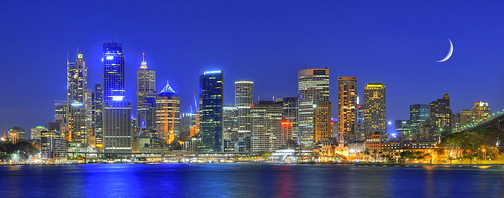 Panorama shot of Sydney Harbour skyline, Central Business District, moon, night shot, Sydney, New South Wales, Australia