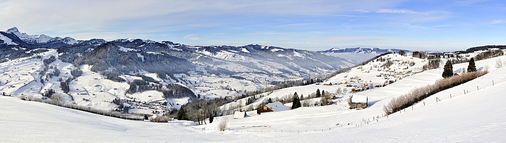 Panoramic view from a mountain meadow of the snow-covered Thur Valley and the Toggenburg Region near Wattwil, Canton of St. Gallen, Switzerland, Europe