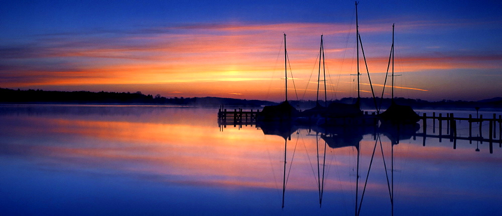 Small boat harbour, sunrise at Lake Chiemsee, Chiemgau, Upper Bavaria, Germany, Europe