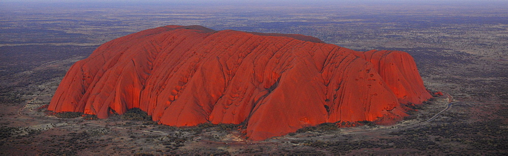 Panorama, aerial view of Uluru, Ayers Rock at sunset, Uluru-Kata Tjuta National Park, Northern Territory, Australia