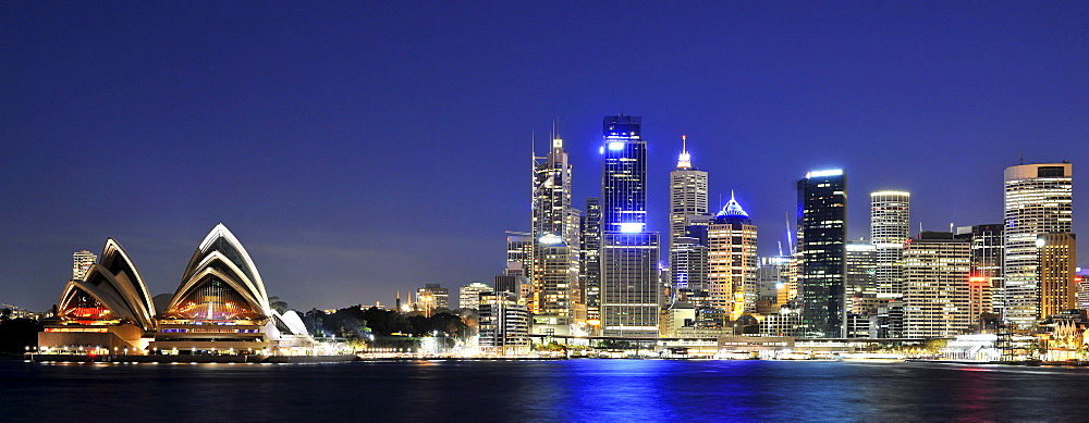 Panorama of Sydney Cove, Sydney Opera House, Circular Quay, port, Sydney skyline, Central Business District, night, Sydney, New South Wales, Australia