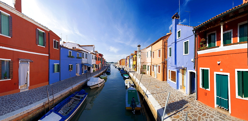 Panoramic view of the city and the colorfully painted houses and canals of Burano, Venice, Italy, Europe