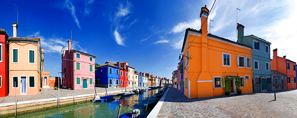 Panoramic view of the city and the colorfully painted houses and canals of Burano, Venice, Italy, Europe