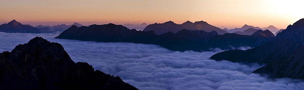 Mountain panorama at sunrise on sea of fog, Gramais, Reutte, Tyrol, Austria, Europe