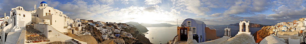 The village of Oia with his typical cycladic architecture at sunrise, Oia, Santorini, Greece