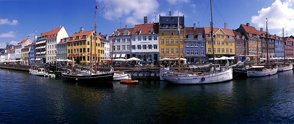 Sailing boats and fishing boats in harbour, Nyhavn, Copenhagen, Denmark