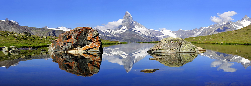 The Matterhorn is reflected in the Stellisee near Zermatt, canton Wallis, Switzerland