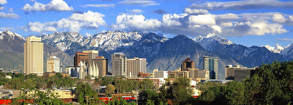 Panoramic view of the Salt Lake City skyline and the snow-covered Wasatch Mountains at back, Utah, USA